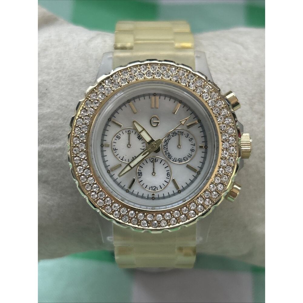 Gossip Gold Tone MOP Dial Rhinestone Bezel Women’s Quartz Watch